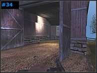 Oczyść budynek przypominający garaż [#34] i zupełnie przy okazji skorzystaj z umieszczonej w jego wnętrzu apteczki - Misja 3 - The Other Side of the River | Medal of Honor Allied Assault Spearhead - Medal of Honor: Allied Assault - Spearhead - poradnik do gry