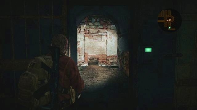 Teraz, korzystając z chwili wytchnienia, możesz zbadać cele - w drugiej z nich możesz zebrać Larwę owada, w trzeciej od końca znajdziesz leżący na ziemi Dokument, natomiast naprzeciwko tejże celi, tylko po drugiej stronie - skrzynię z amunicją - Przejdź przez budynek | Kolonia karna - Barry | Resident Evil Revelations 2 - Resident Evil: Revelations 2 - Kolonia Karna - poradnik do gry