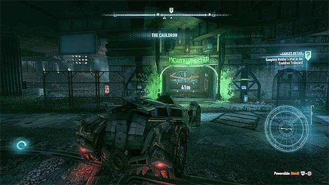 Po dotarciu do dzielnicy Cauldron wjedź batmobilem do zielonego garażu - Wprowadzenie do zadania | Zemsta Człowieka-Zagadki | Batman Arkham Knight - Batman Arkham Knight - poradnik do gry