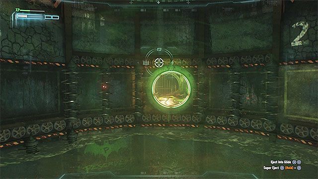 Kontynuuj opuszczanie batmobilu do momentu, w którym znajdzie się on tuż nad pracującymi wiertłami - Siódma próba Człowieka-Zagadki | Zemsta Człowieka-Zagadki | Batman Arkham Knight - Batman Arkham Knight - poradnik do gry