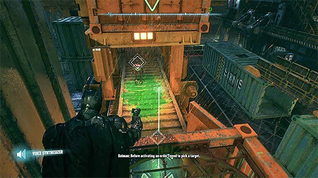 Wysyłaj roboty pod kontener i następnie miażdż je trafiając w pytajnik batarangiem - Trofea Człowieka-Zagadki na wyspie Founders Island (17-33) | Wyspa Founders Island - Batman Arkham Knight - poradnik do gry