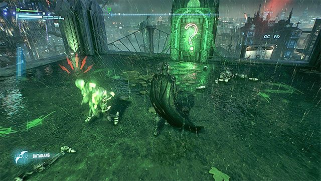 Trafienie w pytajnik zagwarantuje ci możliwość atakowania czerwonych robotów - Trofea Człowieka-Zagadki na wyspie Miagani Island (1-19) | Wyspa Miagani Island - Batman Arkham Knight - poradnik do gry