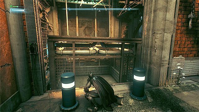 Wejdź do windy po tym jak zostanie ona maksymalnie podniesiona z pomocą batmobilu - Uratowanie zaginionych pracowników fabryki | Główny wątek fabularny - Batman Arkham Knight - poradnik do gry