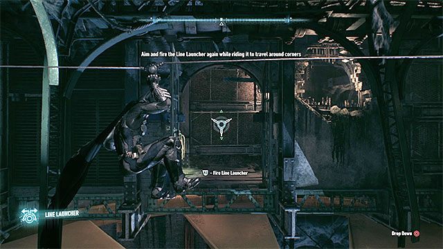 Trafienie zdalnym batarangiem w przycisk odblokuje boczne przejście i musisz się tam od razu przemieścić z wykorzystaniem wyrzutni lin - Zinfiltrowanie sieci tuneli pod wyspą Miagani | Główny wątek fabularny w Batman - Batman Arkham Knight - poradnik do gry