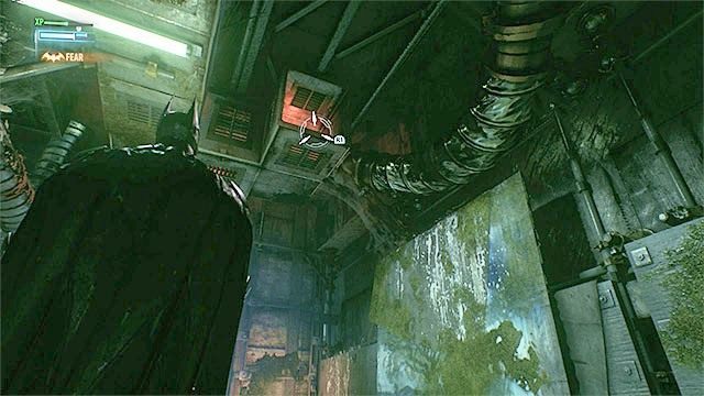 Wejście do szybu wentylacyjnego jest dość dobrze ukryte - Pojmanie Johnnyego Charismy przebywającego na scenie C | Główny wątek fabularny - Batman Arkham Knight - poradnik do gry