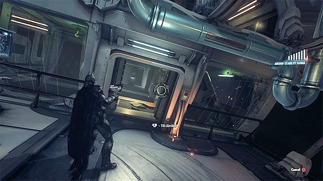 Przechylaj sterowiec żeby uderzać dużą skrzynię w oszklony fragment ściany - Trofea Człowieka-Zagadki na pokładach sterowców Stagga (1-10) | Sekrety - Sterowce Stagga - Batman Arkham Knight - poradnik do gry