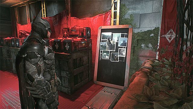 Odszukaj tablicę obok skrzyń z bronią - Zagadki słowne w bazie rycerza Arkham | Sekrety - Baza rycerza Arkham - Batman Arkham Knight - poradnik do gry