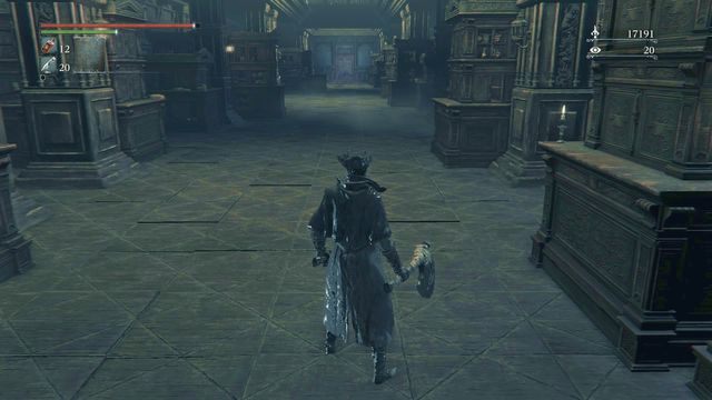 Drzwi na końcu głównego korytarza prowadzą do kolejnej lokacji. - Budynek Auli | Opis przejścia Bloodborne - Bloodborne - poradnik do gry