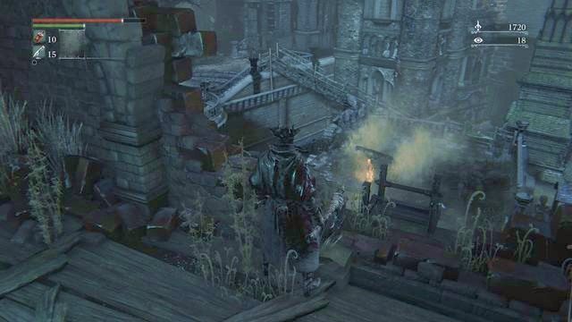 W chwili przerwy pomiędzy ostrzałem (trwa ona parę sekund) podejdź do prawej krawędzi, gdzie zeskocz na dół - Stare Yharnam | Opis przejścia Bloodborne - Bloodborne - poradnik do gry