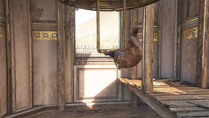 Rozbujaj się po złapaniu się głównego dzwonu - Uncharted 4 Kres Złodzieja: Rozdział 11 Najciemniej pod latarnią - solucja, opis przejścia - Uncharted 4: Kres Złodzieja - poradnik do gry