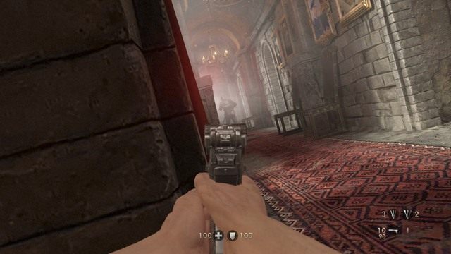 Jak znajdziesz się po drugiej stronie lokacji, wychyl się zza murku, a dostrzeżesz w korytarzu pierwszego wroga - Rozdział 3 - Twierdza Wolfenstein | Opis przejścia Wolfenstein The Old Blood - Wolfenstein: The Old Blood - poradnik do gry