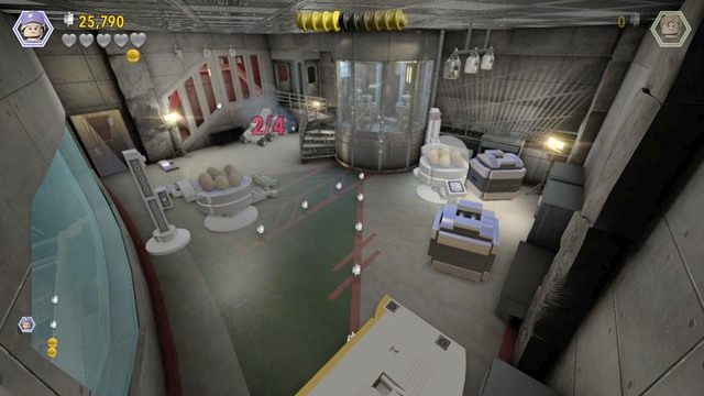 Omawianym robotem, niszcz wszystkie srebrne pojemniki widniejące na obrazku - Centrum dla odwiedzających | Jurassic Park - sekrety (misje) - LEGO Jurassic World - poradnik gry