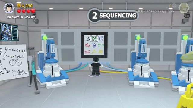 Po wejściu do środka, zmień postać na Malcolma i rozwiąż zagadkę widniejącą na obrazku - Wielkie starcie | Jurassic World - sekrety w misjach - LEGO Jurassic World - poradnik gry
