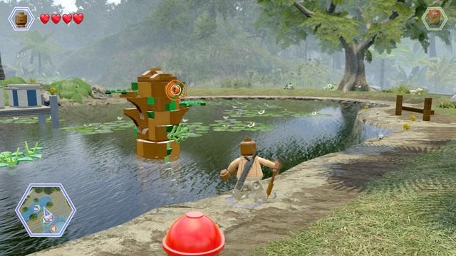 Podejdź do słupa na wodzie i przechyl go za pomocą liny Barryego - Centrum dla odwiedzających | Jurassic Park - sekrety - LEGO Jurassic World - poradnik gry