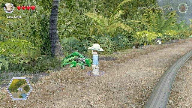 Podejdź do blokujących klocki roślin i przetnij je jako Grant - Centrum dla odwiedzających | Jurassic Park - sekrety - LEGO Jurassic World - poradnik gry
