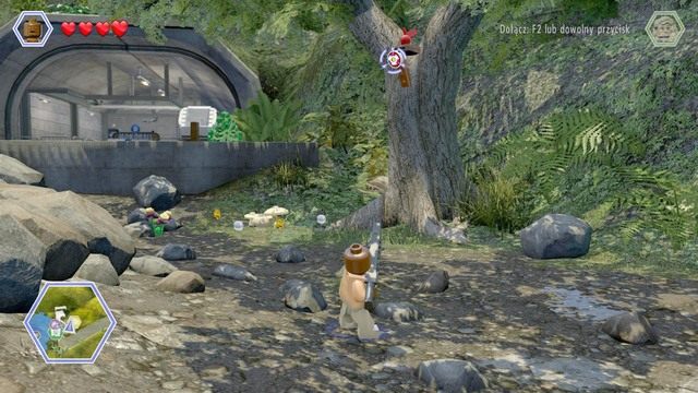 Strzel w widoczną na obrazku tarczę i zmień postać na velociraptora - Lądowisko helikoptera | Jurassic Park - sekrety - LEGO Jurassic World - poradnik gry