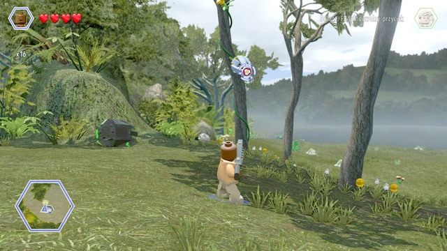 Podejdź do widocznego na obrazku miejsca i strzel w stronę tarczy - Równiny Brachiozaurów | Jurassic Park - sekrety - LEGO Jurassic World - poradnik gry