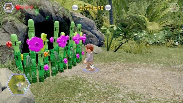 Podejdź jako Grant do roślin blokujących dostęp do jaskini i przetnij je - Terytorium Dilofozaura | Jurassic Park - sekrety - LEGO Jurassic World - poradnik gry