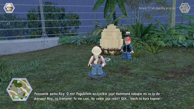 Podejdź do widocznego na obrazku miejsca i dowiedz się co trzeba wykonać by pomóc pracownikowi - Terytorium mięsożerców | Jurassic Park - sekrety - LEGO Jurassic World - poradnik gry