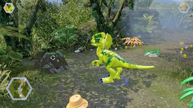 Po wyjściu z ptaszarni, dostań się do miejsca pokazanego na obrazku i zniszcz czarny pojemnik Dilofozaurem - Ptaszarnia na Isla Nublar | Jurassic World - sekrety - LEGO Jurassic World - poradnik gry