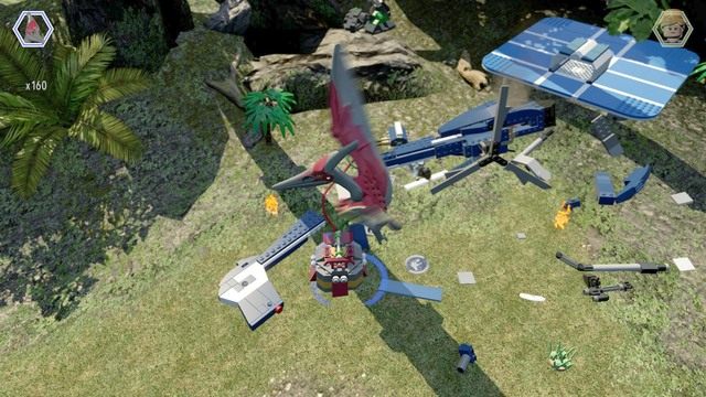 Podleć do wraku helikoptera jako Pteranodon i zawieś się na widocznym drążku by uwolnić przygniecionego pracownika - Ptaszarnia na Isla Nublar | Jurassic World - sekrety - LEGO Jurassic World - poradnik gry