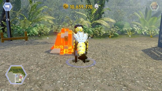 Będąc za bramą niszcz pokazane na obrazku pomarańczowe klocki za pomocą tyranozaura - Terytorium Indominusa | Jurassic World - sekrety - LEGO Jurassic World - poradnik gry