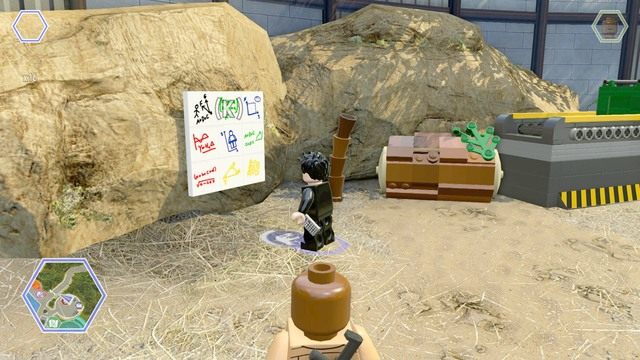 Podejdź do zagadki jako Malcolm i rozwiąż jej prawidłową kolejność by uzyskać dostęp do pierwszego przedmiotu - Wschodni bulwar | Jurassic World - sekrety - LEGO Jurassic World - poradnik gry