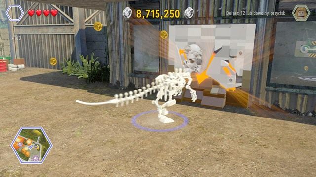 Pierwszy złoty klocek znajdziesz w garażu - Centrum komunikacyjne | Jurassic Park The Lost World - sekrety - LEGO Jurassic World - poradnik gry