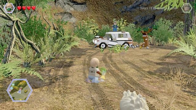 Podejdź do samochodu jako Eric i rzuć zapach tyranozaura w stronę żerujących tam kompsognatów - Tereny łowieckie | Jurassic Park The Lost World - sekrety - LEGO Jurassic World - poradnik gry