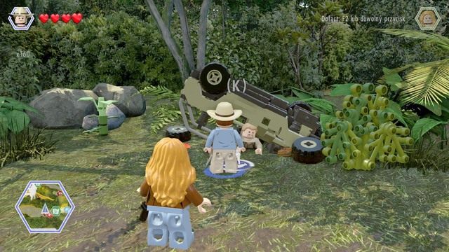 Podejdź do uwięzionego pracownika i wyciągnij go spod samochodu - Wysoka trawa | Jurassic Park The Lost World - sekrety - LEGO Jurassic World - poradnik gry