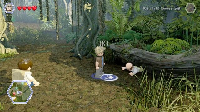 Podejdź do pracownika w opałach, zablokowanego w pniu i wyciągnij go używając dowolnej postaci - Terytorium Ankylozaura | Jurassic Park III - sekrety - LEGO Jurassic World - poradnik gry