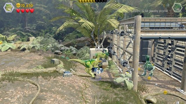 Kiedy dojdziesz do przedstawionego na obrazku miejsca, pociągnij za drążek dowolnym raptorem i zmień postać na drugiego - Witamy w Świecie Jurajskim | Jurassic World - opis przejścia - LEGO Jurassic World - poradnik gry