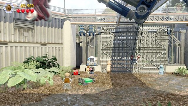 Ze zniszczonej tarczy wypadnie czerwony drążek - Witamy w Świecie Jurajskim | Jurassic World - opis przejścia - LEGO Jurassic World - poradnik gry