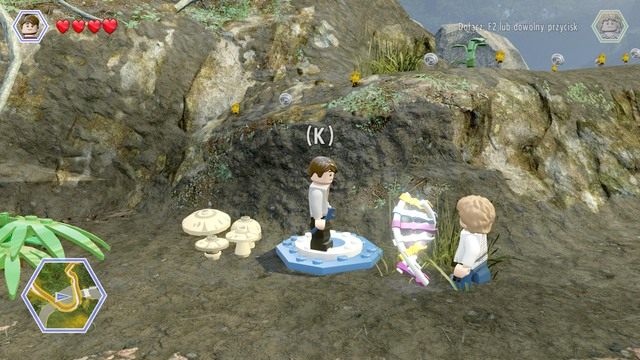 Jako Zach Mitchell udaj się do miejsca, które wskazują turkusowe klocki i użyj mechanizmu pokazanego na obrazku - Na wolności | Jurassic World - opis przejścia - LEGO Jurassic World - poradnik gry