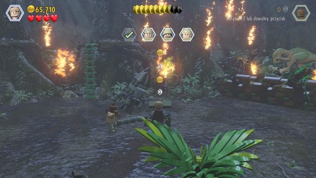 Kontrolując Owena, dostań się na górę i przetnij linę blokującą dostęp do drabiny oraz zniszcz rośliny, w których uwięziony jest samochód - Atak | Jurassic World - opis przejścia - LEGO Jurassic World - poradnik gry