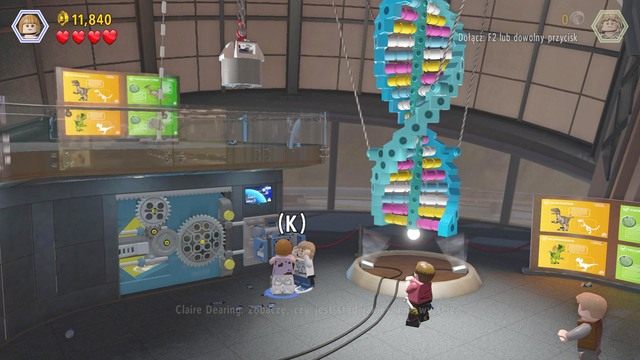 Zmień postać na Claire i podejdź do panelu sterowania po czym otwórz właz blokujący przejście - Wielkie starcie | Jurassic World - opis przejścia - LEGO Jurassic World - poradnik gry