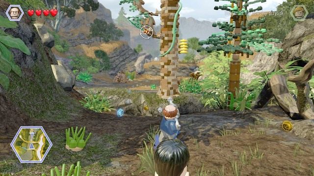 Przy kolejnej blokadzie, którą widać na obrazku, zmień postać na Eddiego i wystrzel z broni do tarczy by opuścić linę - Przybycie InGenu | Jurassic Park The Lost World - opis przejścia - LEGO Jurassic World - poradnik gry