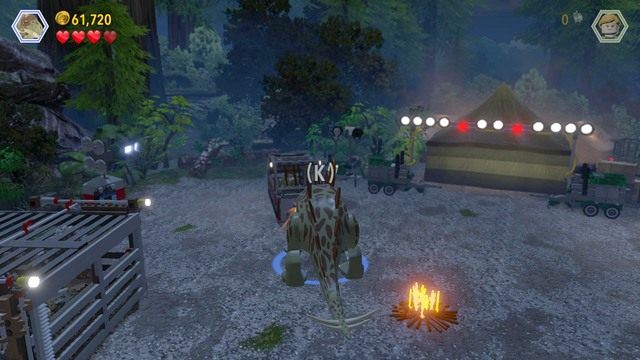 Kontrolując stegozaura podejdź do klatki z kolejnym dinozaurem i zniszcz pomarańczową ściankę z LEGO - Przybycie InGenu | Jurassic Park The Lost World - opis przejścia - LEGO Jurassic World - poradnik gry