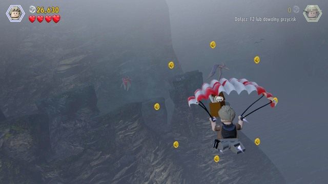 Dojdź do blokującego przejście obiektu z klocków, zniszcz go i wykonaj trampolinę - Klatka dla ptaków | Jurassic Park III - opis przejścia - LEGO Jurassic World - poradnik gry