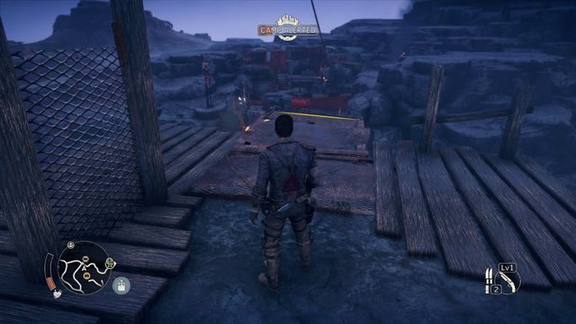 Zjazdy, półki skalne i wąskie przejścia mogą prowadzić do wcześniej ominiętych miejsc. - Przejmowanie obozów w Mad Max | Aktywności - Mad Max - poradnik do gry