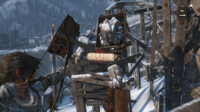 Pozbądź się blokującego możliwość skoku dalej wózka wystrzeliwując kolejną strzałę z liną - Rise of the Tomb Raider: Dotrzyj do wejścia do kopalni | Znów sama - Rise of the Tomb Raider - poradnik do gry