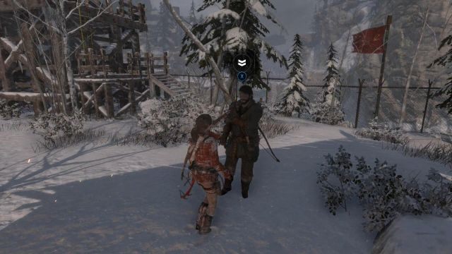 Zaraz po zjeździe na linie natkniesz się na jednego z tubylców, zwących się Ocalałymi - Rise of the Tomb Raider: Znajdź wejście do starego więzienia | W szeregach wroga - Rise of the Tomb Raider - poradnik do gry