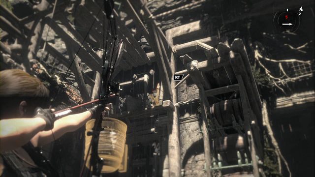 Stojąc niedaleko wozu popatrz się w górę, w stronę wiszącego wiadra - Grobowiec 2 - Dom przeklętych | Geotermiczna dolina | Rise of the Tomb Raider - Rise of the Tomb Raider - poradnik do gry