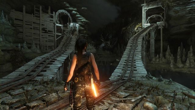 Najpierw zajmij się pierwszym wagonikiem, z prawej strony. - Grobowiec 3 - Jama sądu ostatecznego | Geotermiczna dolina - Rise of the Tomb Raider - poradnik do gry