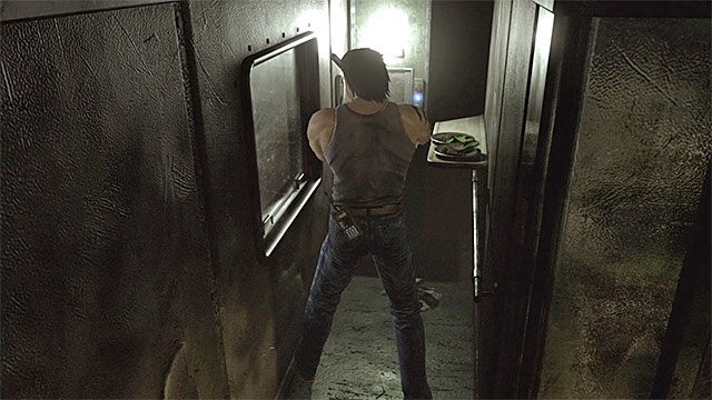 Odszukaj windę na dolnym poziomie wagonu (grając jako Billy) - Początek współpracy z Billym | Pociąg Ecliptic Express | Resident Evil Zero HD - Resident Evil Zero HD - poradnik do gry