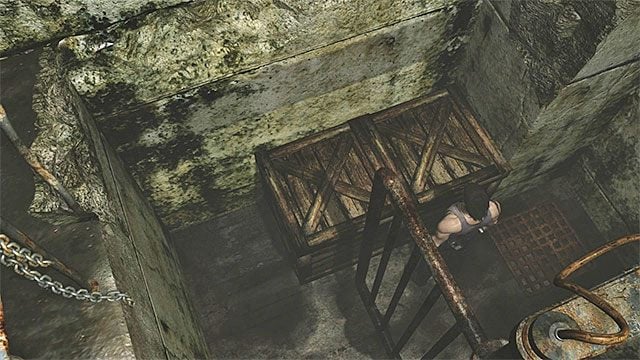 Powróć Billym w okolice drabinki i zainteresuj się drewnianą skrzynią zlokalizowaną najbliżej niej - jest ona widoczna na obrazku 1 - Rozwiązanie zagadki ze skrzyniami | Oczyszczalnia | Resident Evil Zero HD - Resident Evil Zero HD - poradnik do gry