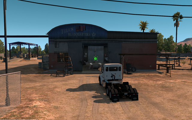 Po zakupie pierwszego pojazdu znajdziesz się przy swoim niezbyt okazałym garażu - Właściciel jednoosobowej firmy w American Truck Simulator | Kariera - American Truck Simulator - poradnik do gry