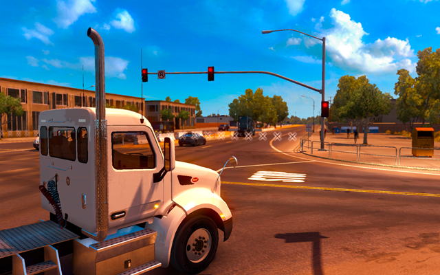 W Ameryce Północnej sygnalizacja świetlna ustawiona jest po drugiej stronie ulicy - Sygnalizacja świetlna i policja | Przemierzanie Stanów ciężarówką - American Truck Simulator - poradnik do gry