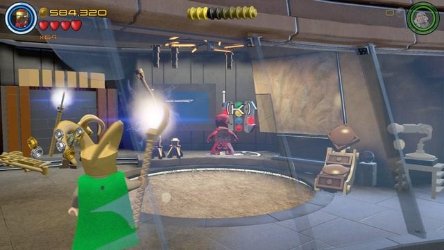 Podczas walki z Lokim w wieży Starka, podejdź jako Iron Man do komputera widocznego na obrazku i uruchom system - Minizestawy | Najpotężniejsi bohaterowie - sekrety | LEGO Marvels Avengers - LEGO Marvels Avengers - poradnik do gry