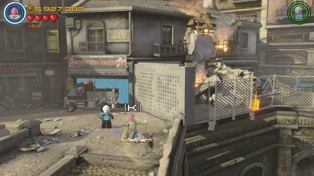 Podejdź jako Vision do widocznego na obrazku graffiti i zamaluj go umiejętnością specjalną, podnosząc farbę - Minizestawy | Świt Ultrona - sekrety - LEGO Marvels Avengers - poradnik do gry